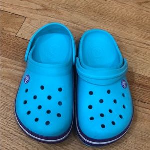 Turquoise and purple Crocs size 3 big kid